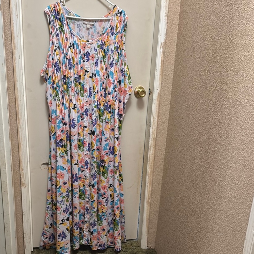 Woman Within Pink and Orange Sleeveless Sundress